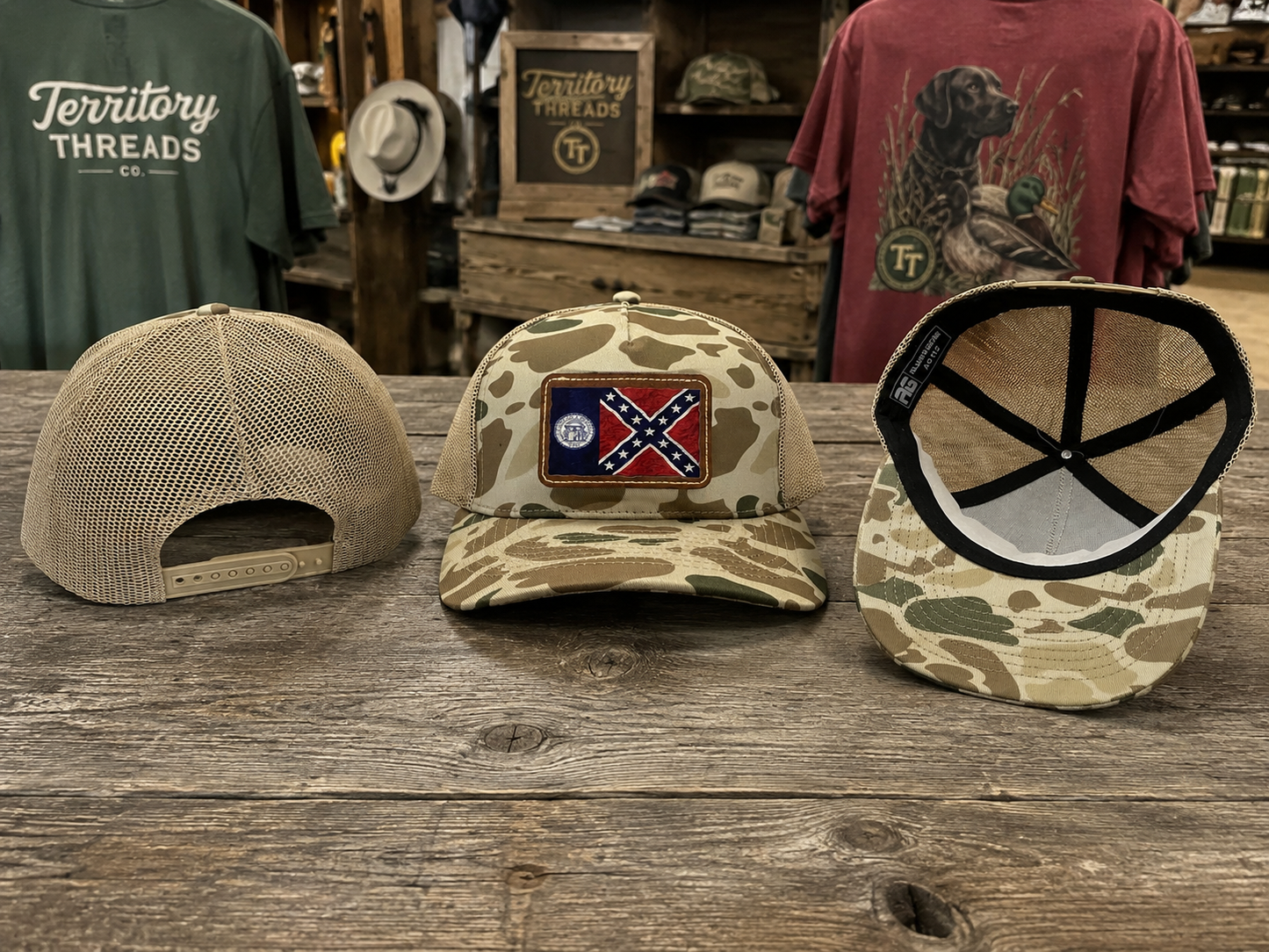 Light brown khaki green camo hat cap featuring a 1956 Old Georgia Flag leather patch with mesh back and adjustable strap