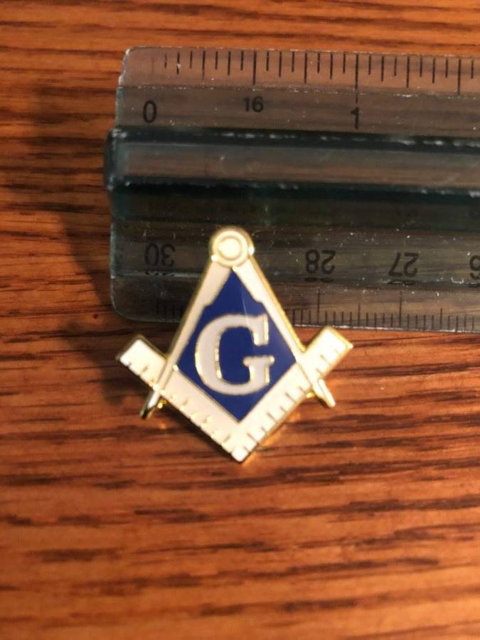 Gold Masonic Square and Compasses Pin lapel accessory symbolizing Freemasonry values