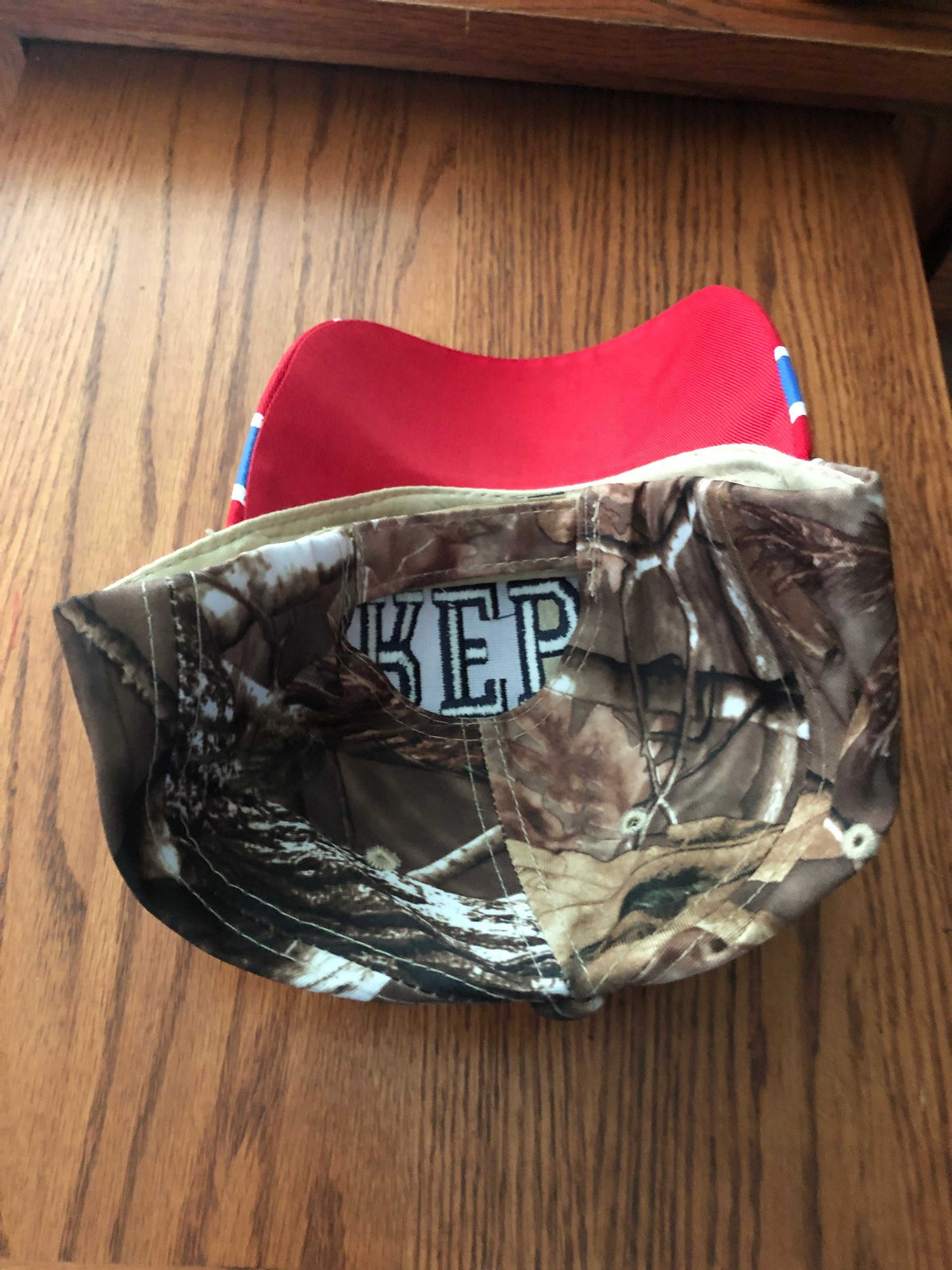 Rebel embroidered camo cap hat with battle flag bill, 100% polyester, velcro closure