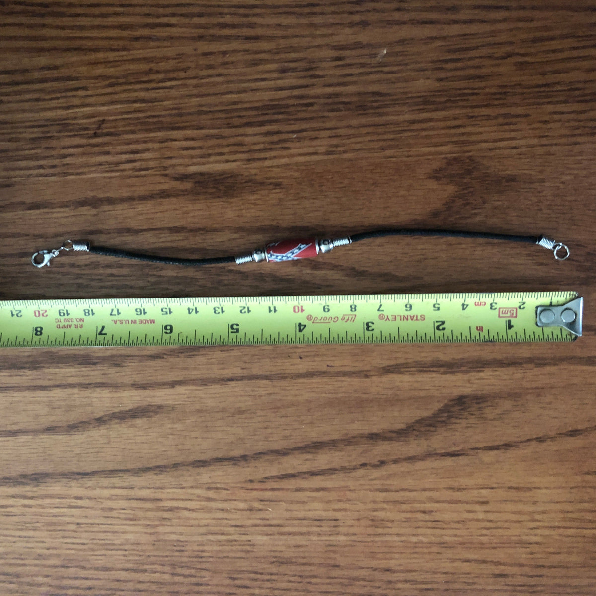 Rebel Battle Flag Single Bead Bracelet showing full length next to a ruler
